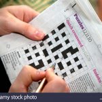 Solving A Quick Newspaper Crossword, London Stock Photo: 32946995   Guardian Printable Quick Crossword