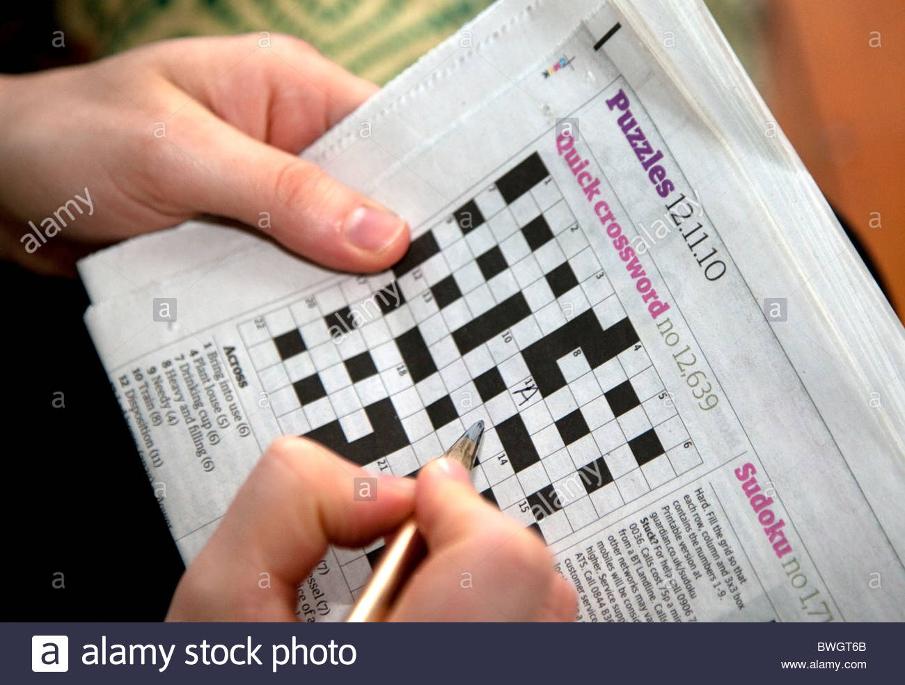 Solving A Quick Newspaper Crossword, London Stock Photo: 32946995 - Guardian Printable Quick Crossword